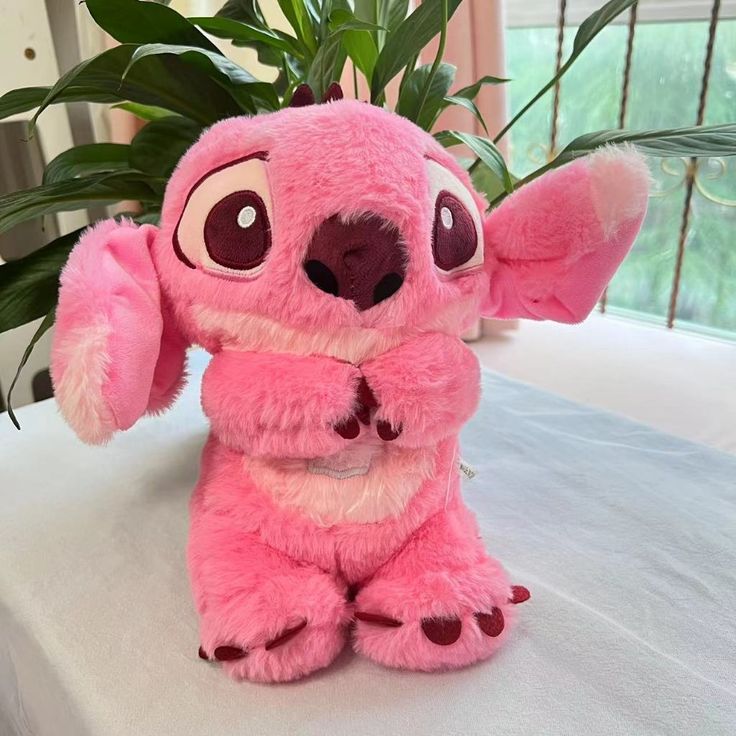 Peluche Stitch que Respira 🩵🩷